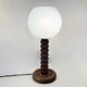 Wooden lamp in wabi-sabi brutalist style by Charles Dudouyt with white opaline.