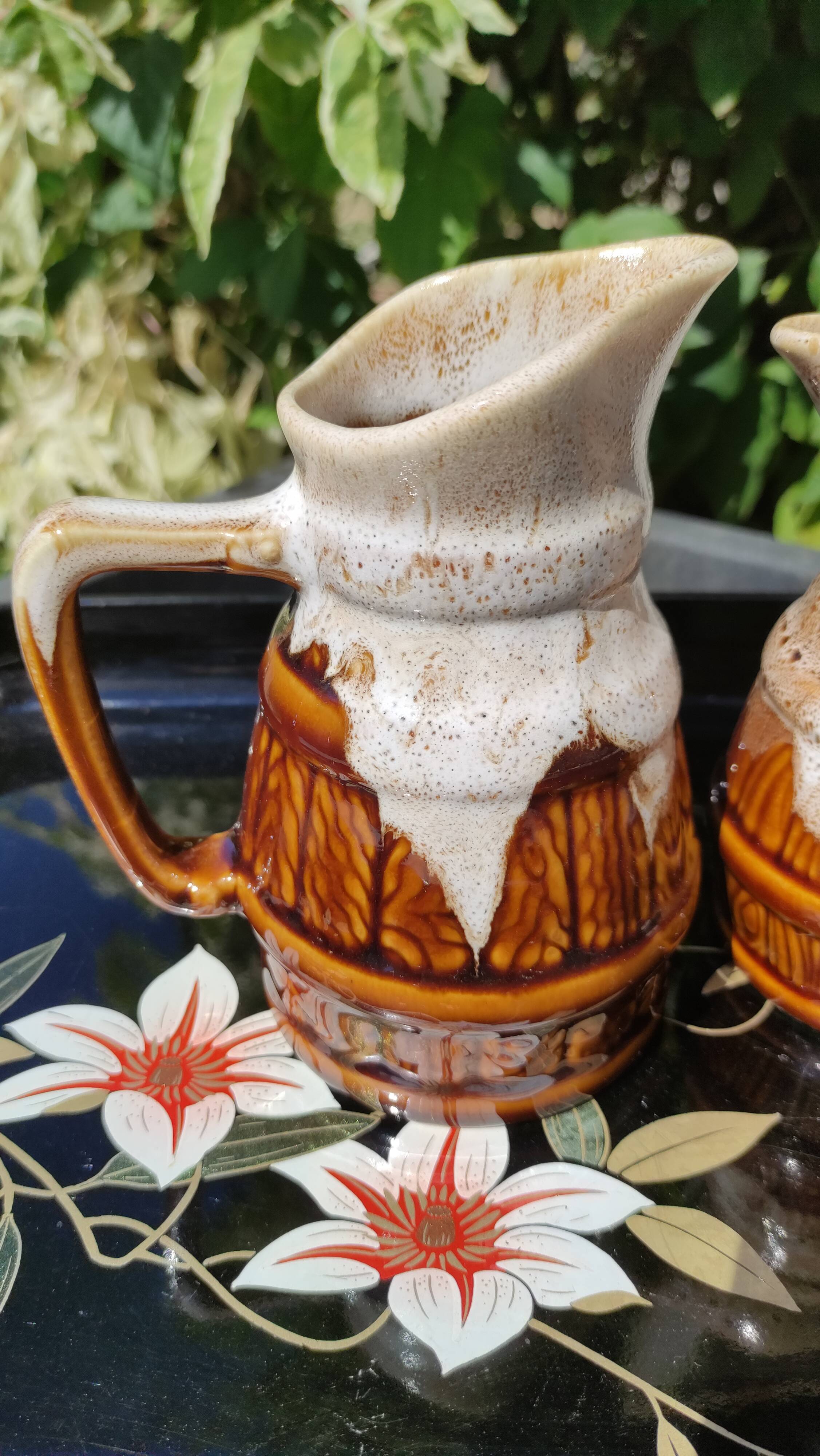 Duo of vintage pitchers Revol