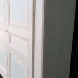 Pair of cupboard doors and old woodwork frame