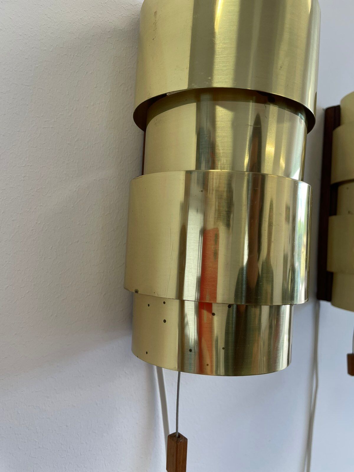 Pair of Scandinavian teak and brass sconces