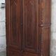 Antique solid wood wardrobe in historical rustic style from the 19th century.