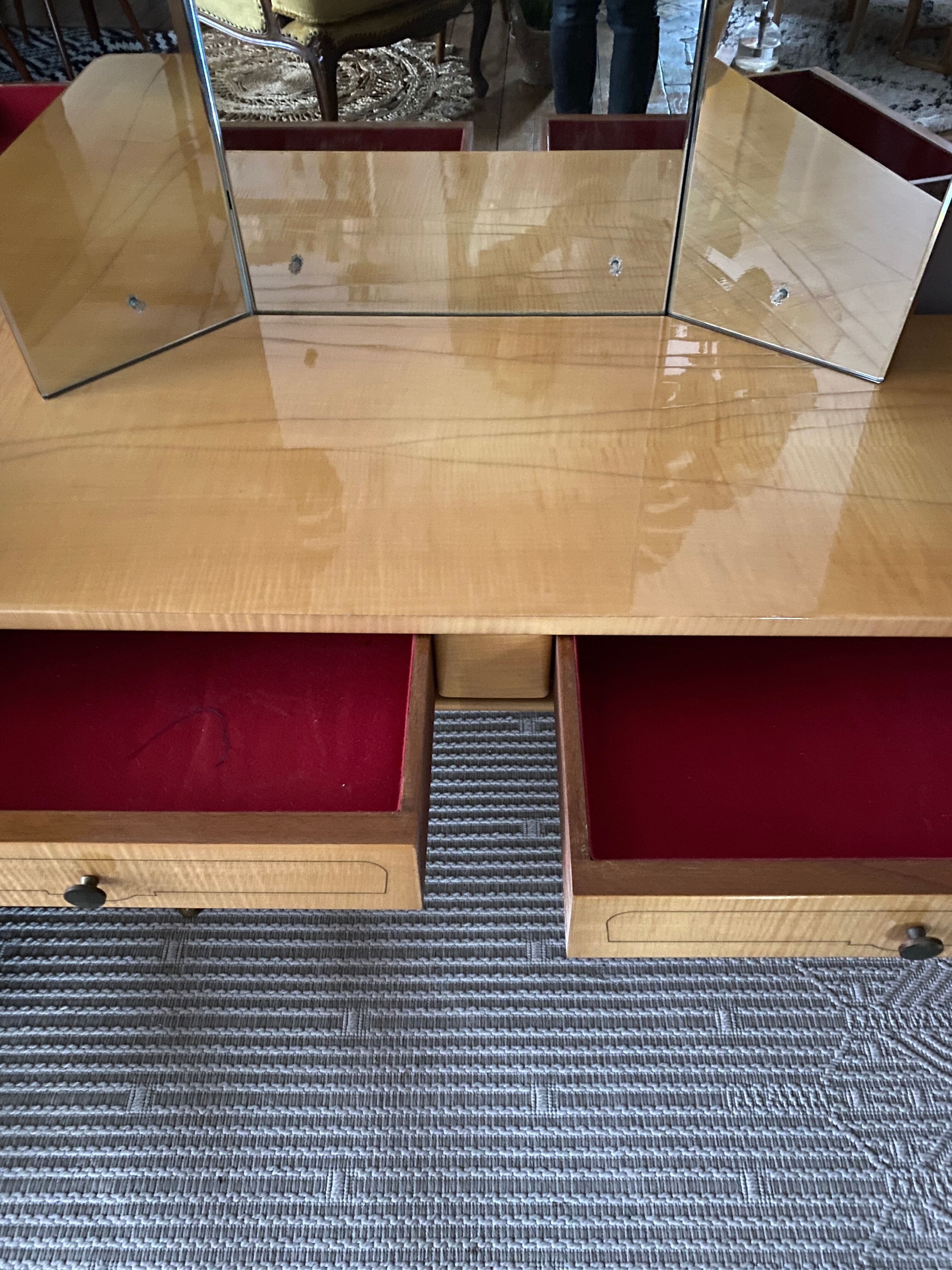 Dressing table in a vintage mirror triptych