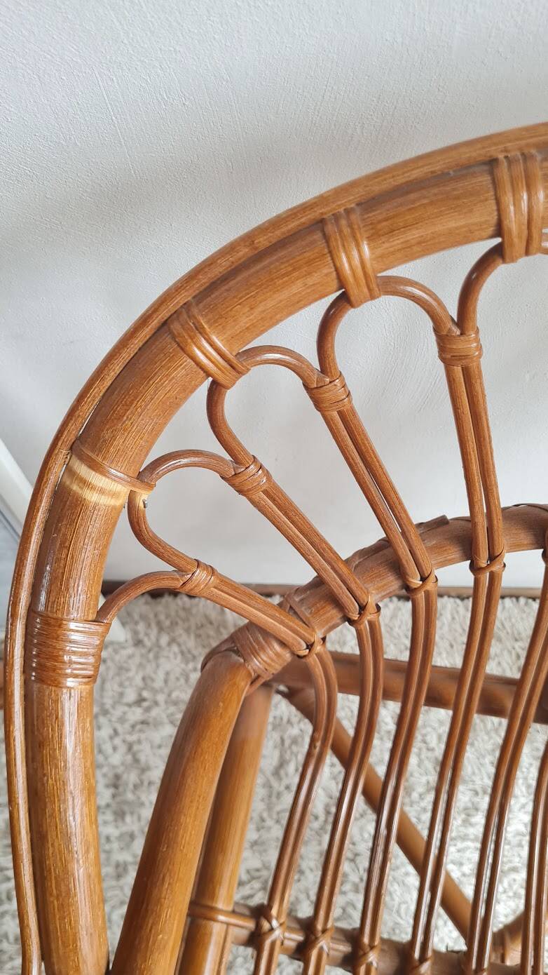 Pair of vintage rattan armchairs circa the 1970s.