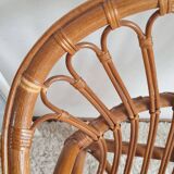 Pair of vintage rattan armchairs circa the 1970s.