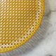 Mathieu Matégot round perforated metal tray, yellow, France 1950s