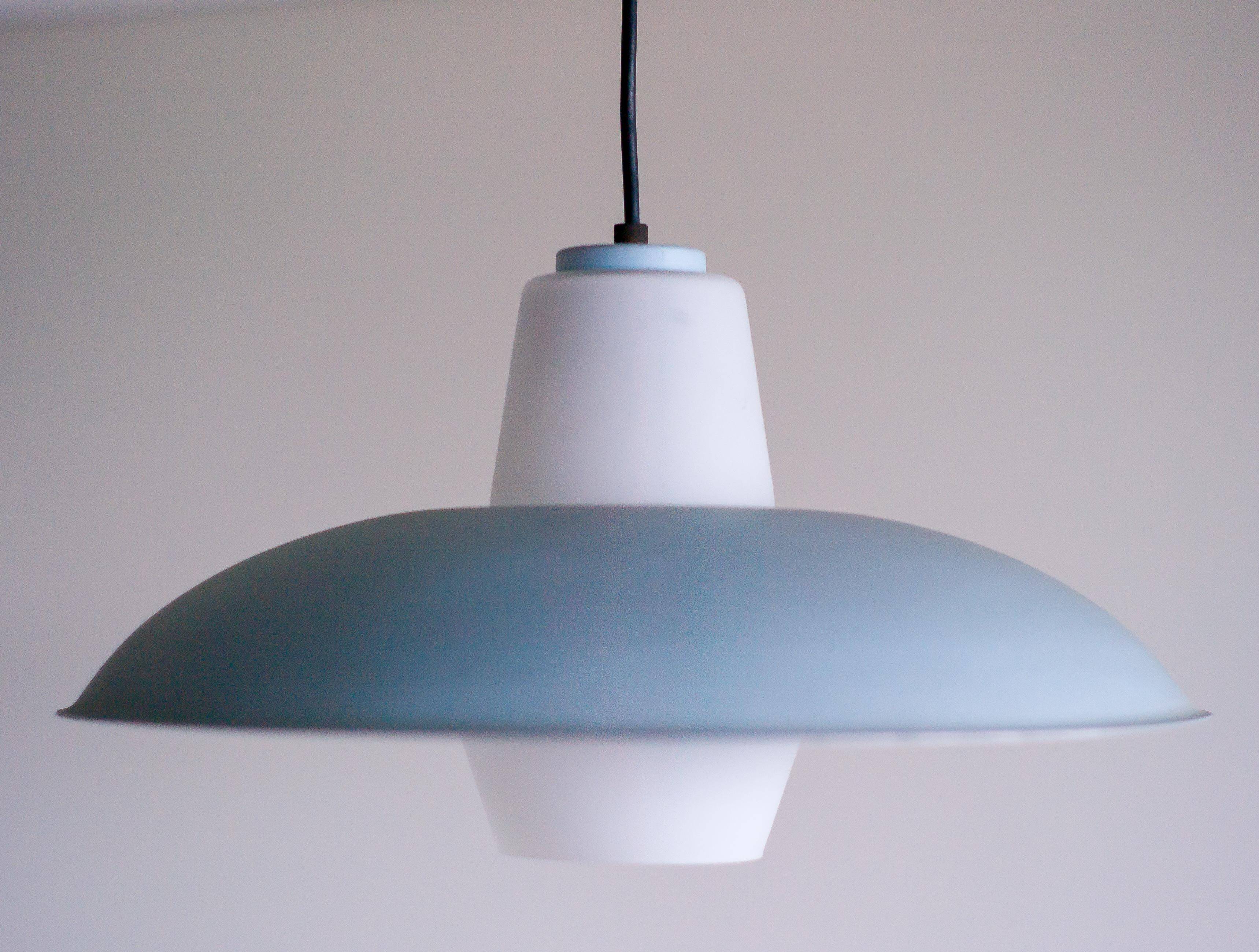 Philips pendant light in frosted sky blue glass by Louis Kalff