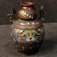 Pair of oriental metal vases from XXth century