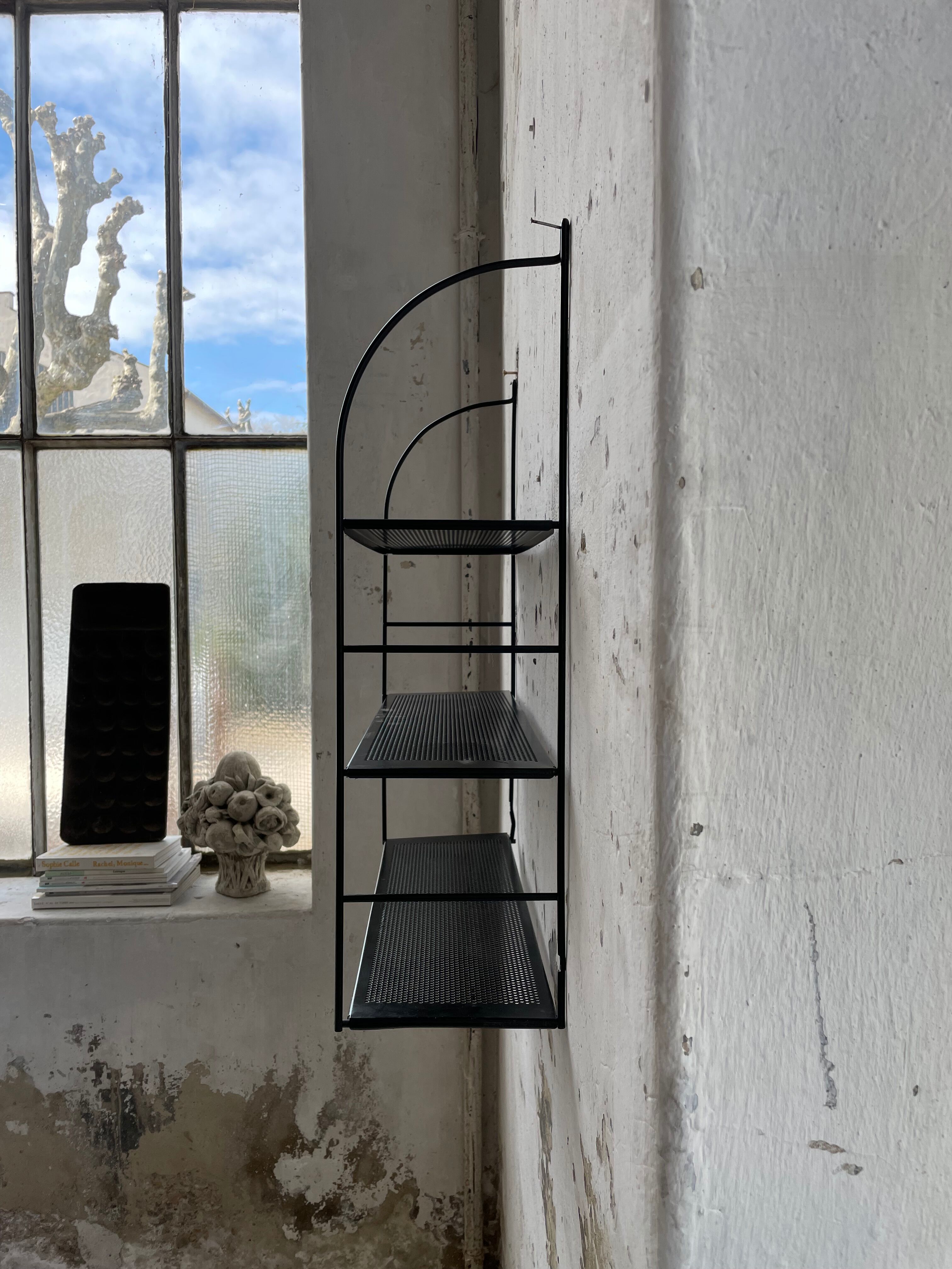 Black metal string shelf