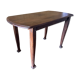 Vintage antique oak table with ornate legs.