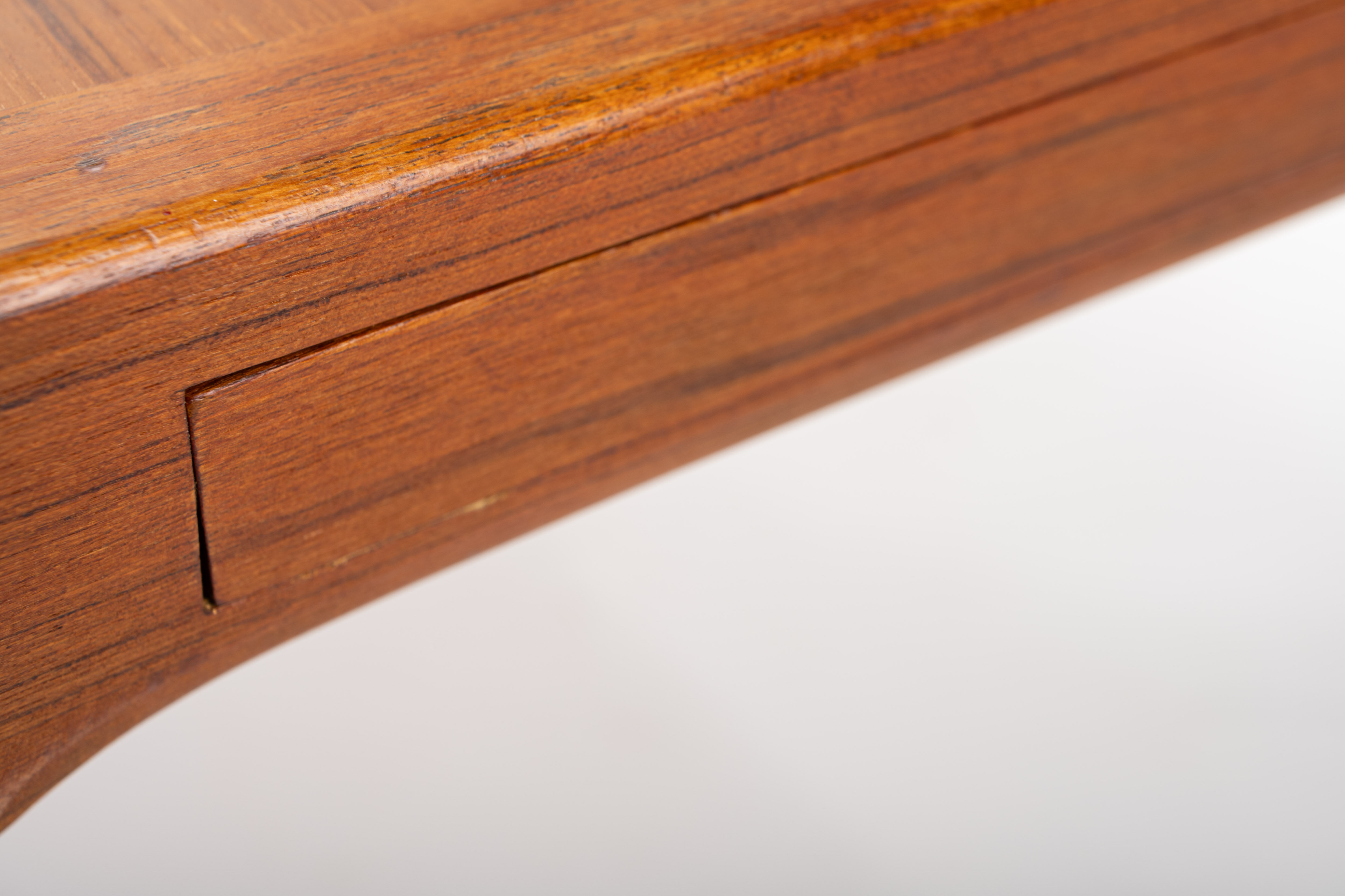 Extendable dining table in teak by Johannes Andersen for Uldum Møbelfabrik