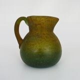 Pitcher in orange and green marble glass paste. Signed Georges De Feure for Daum