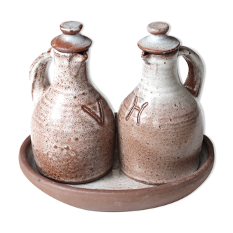 Oil pitchers and vinegar in sandstone by Jeanne and Norbert Pierlot, 60s