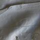 Pair of 19th century linen thread pillowcases embroidered with scallops