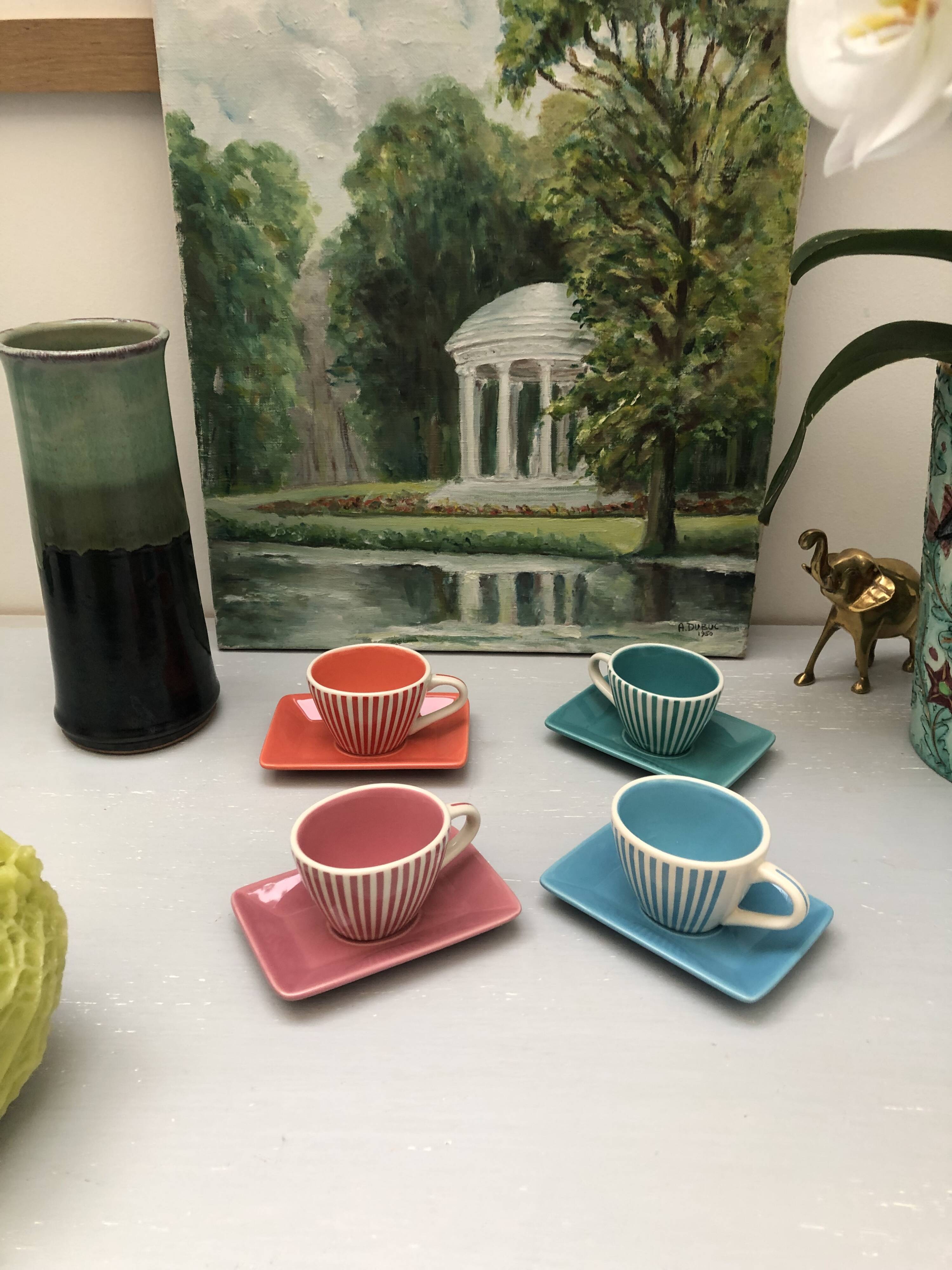 4 vintage ceramic coffee cups produced by LBVYR Circa