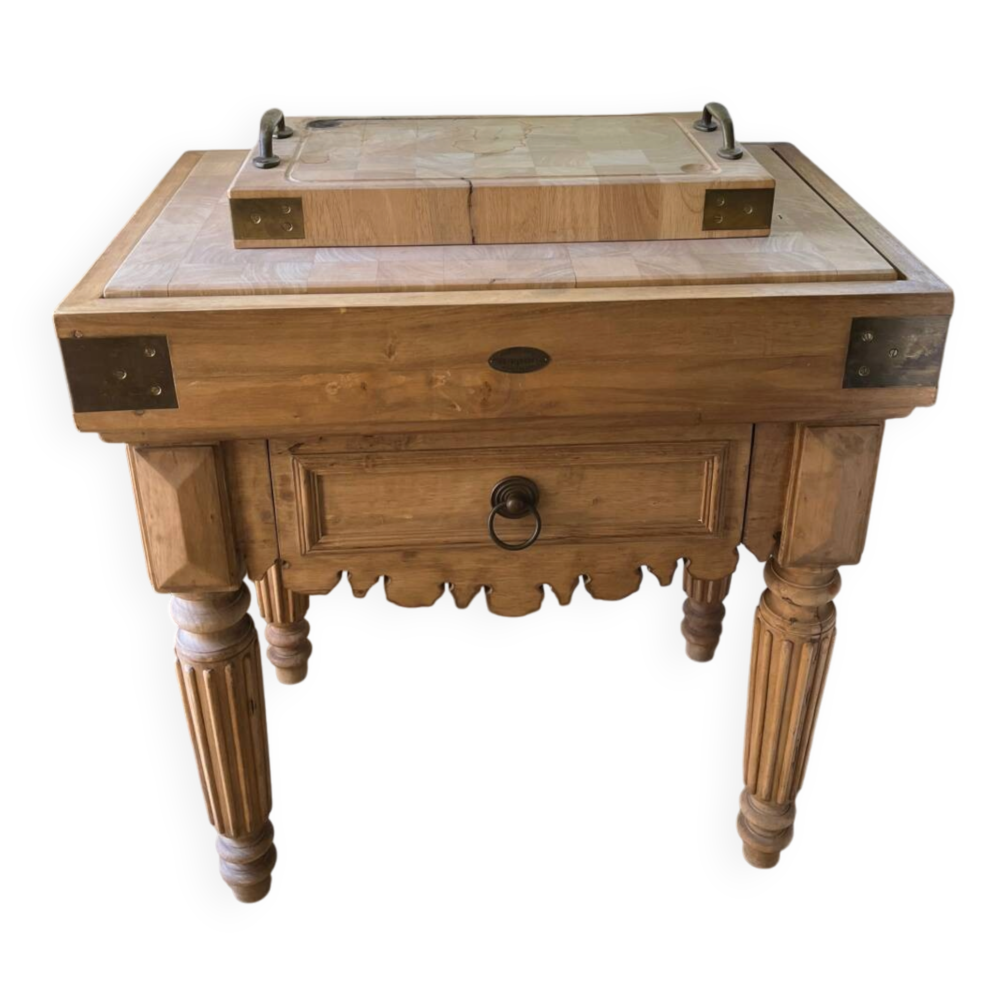 Genuine butcher's block made of solid wood with a knife drawer.