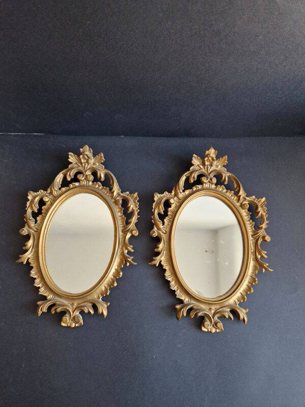Pair of gilded rococo style mirrors, 1970s