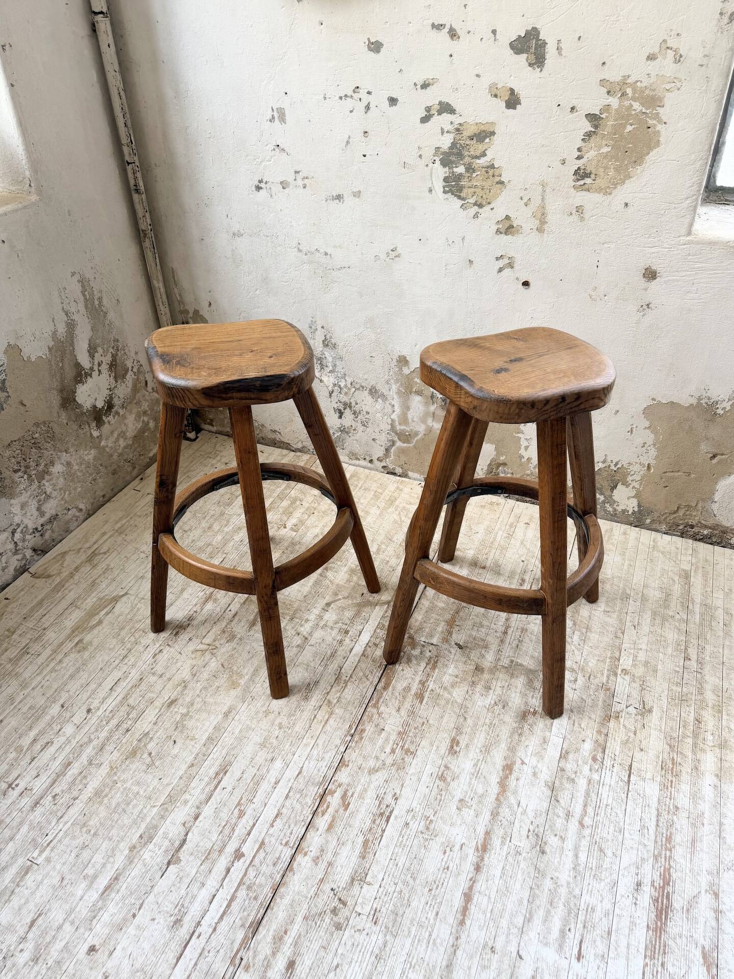 Pair of Henri Bataille stools in oak