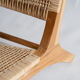 Reclining armchair in natural wood and woven rattan
