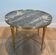 Table basse ronde en laiton et plateau de marbre de la maison Ramsay