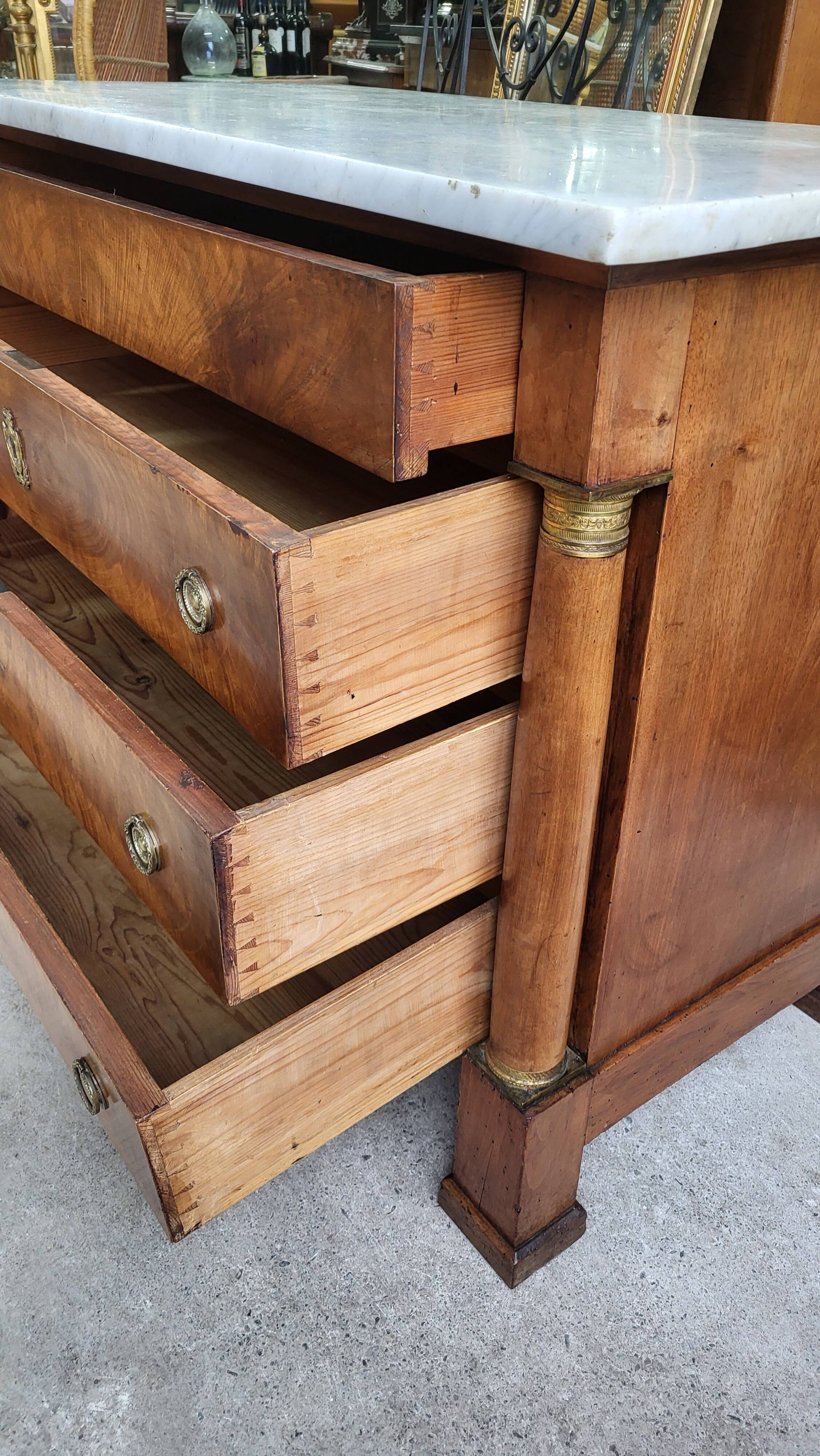 Empire commode in walnut with white marble top from the 19th century