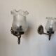 Pair of wall sconces in bronze with opaline glass tulips.