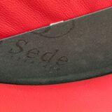 Fauteuil à roulettes en cuir rouge, maison de sede. (prix pour un)