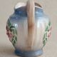 Earthenware milk jug