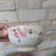 Old opaque porcelain bowl from Gien with a floral decoration.
