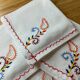 4 serviettes de table en coton brodées
