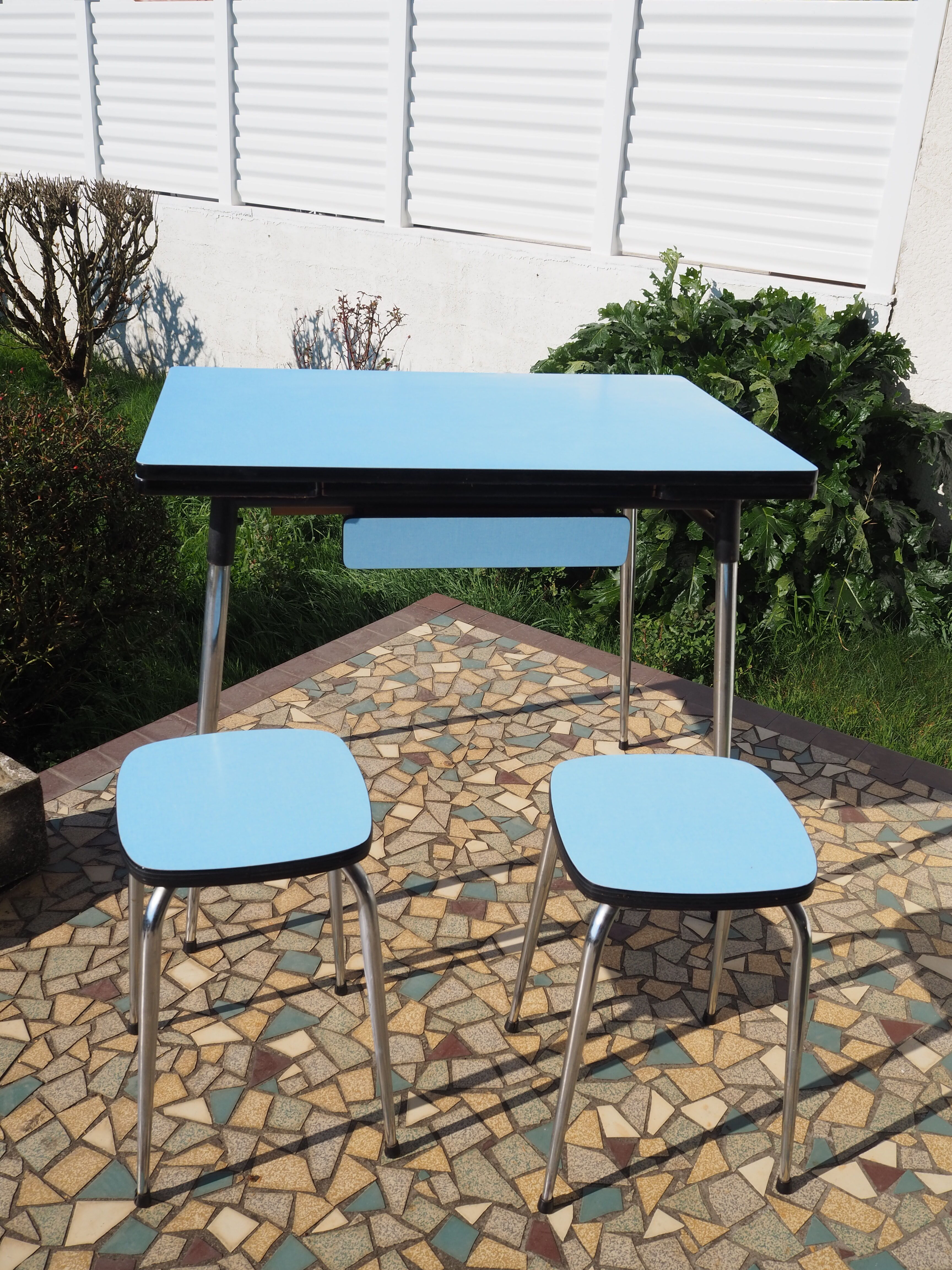 Blue formica table and two stools
