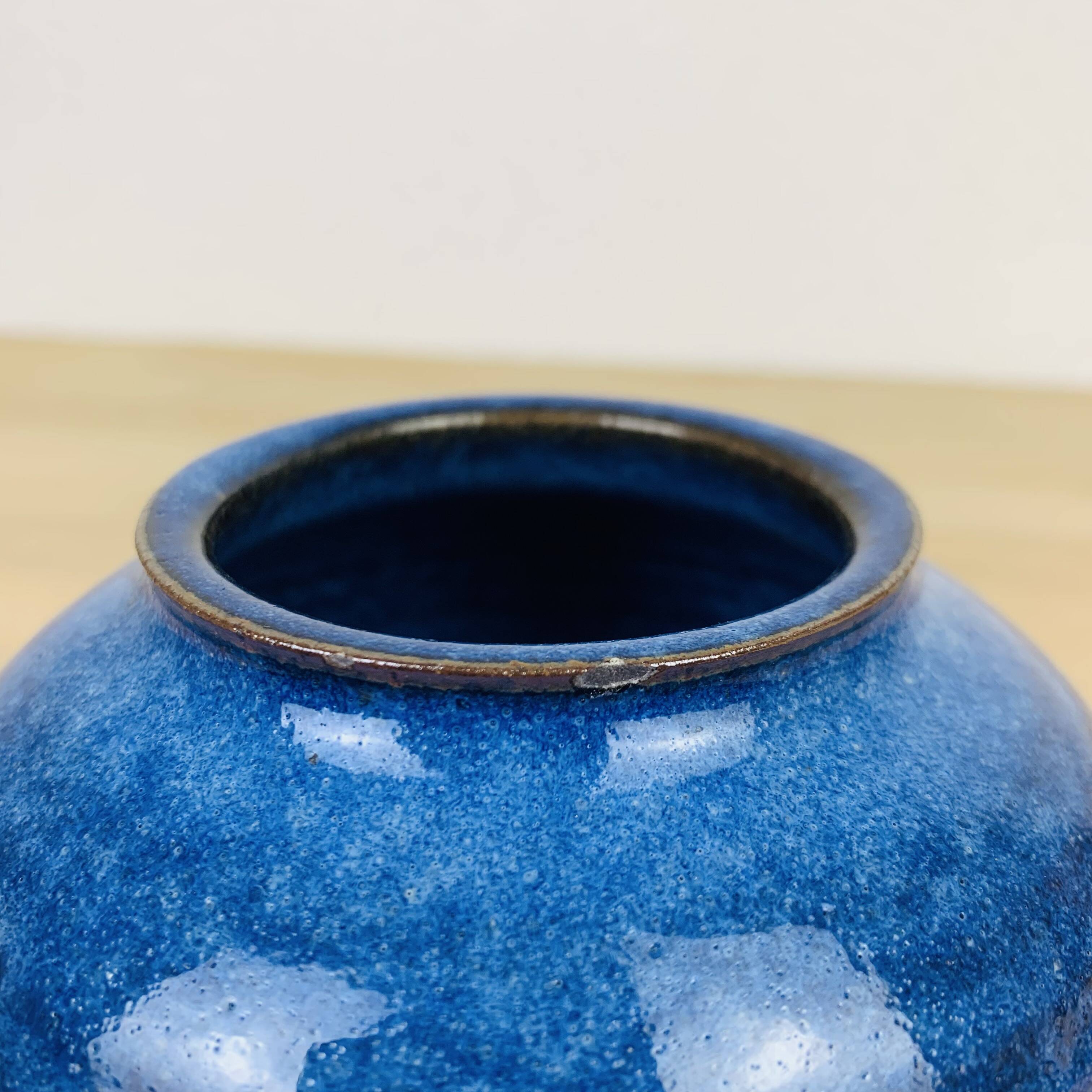 Blue ceramic ball vase