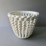 Openwork and braided ceramic pot cover