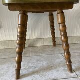 Wooden dressing table with olive green chair and floral patterns