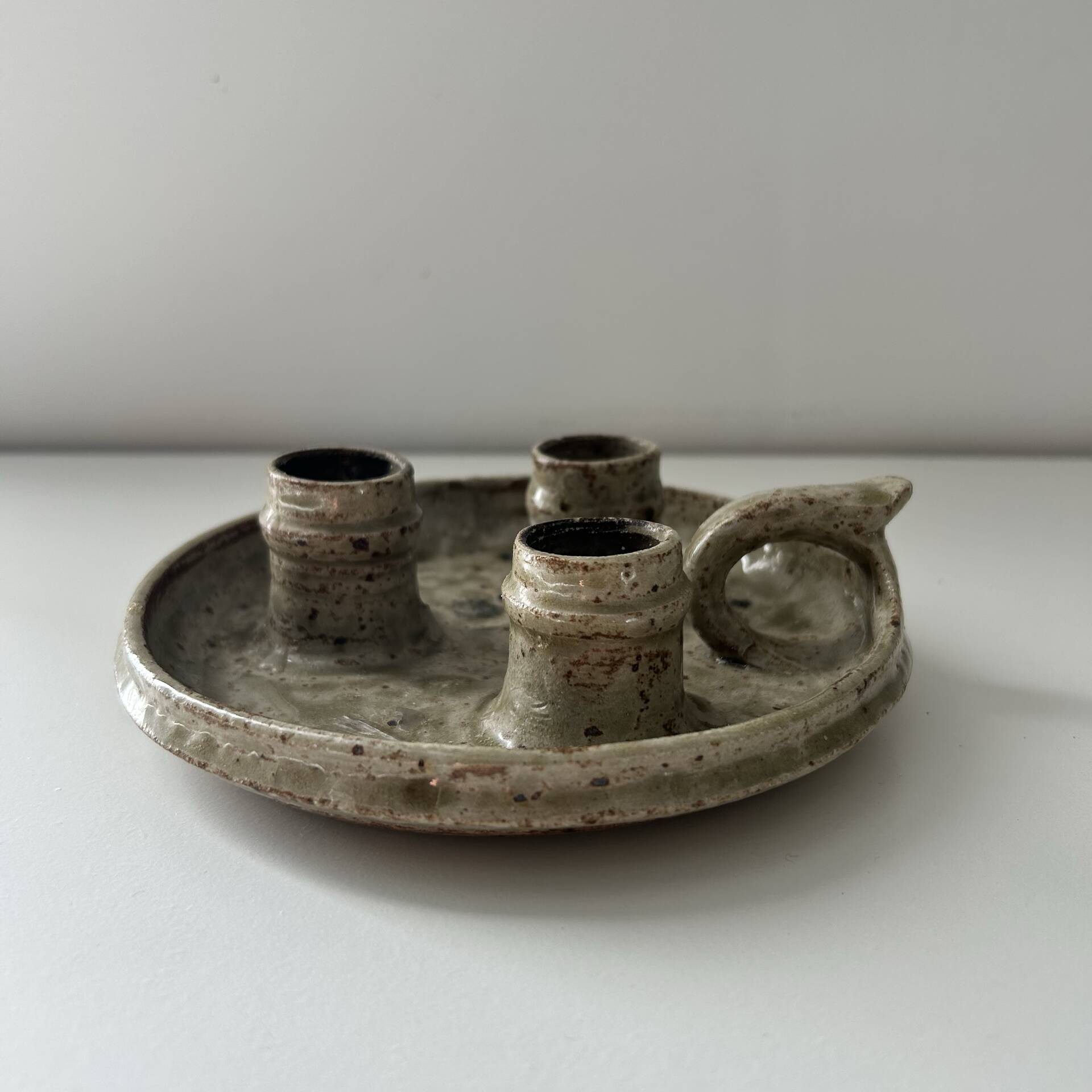 Unusual candlestick with 3 candle holders