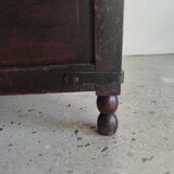 Natural wood chest forming a bench, ringed shoulders