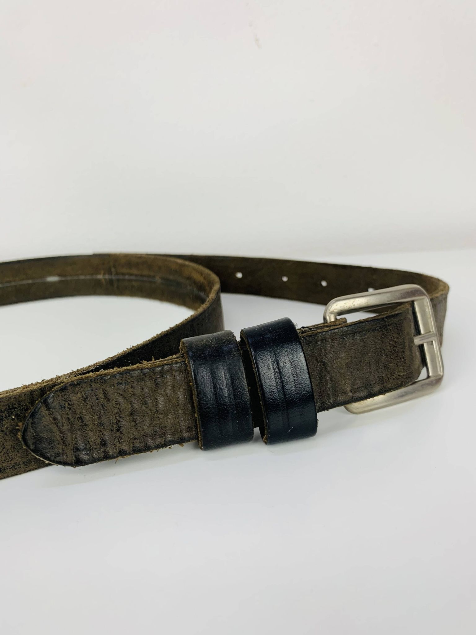 Mirror with handmade leather strapping