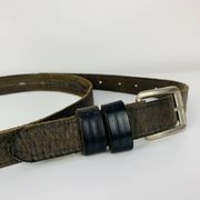 Mirror with handmade leather strapping