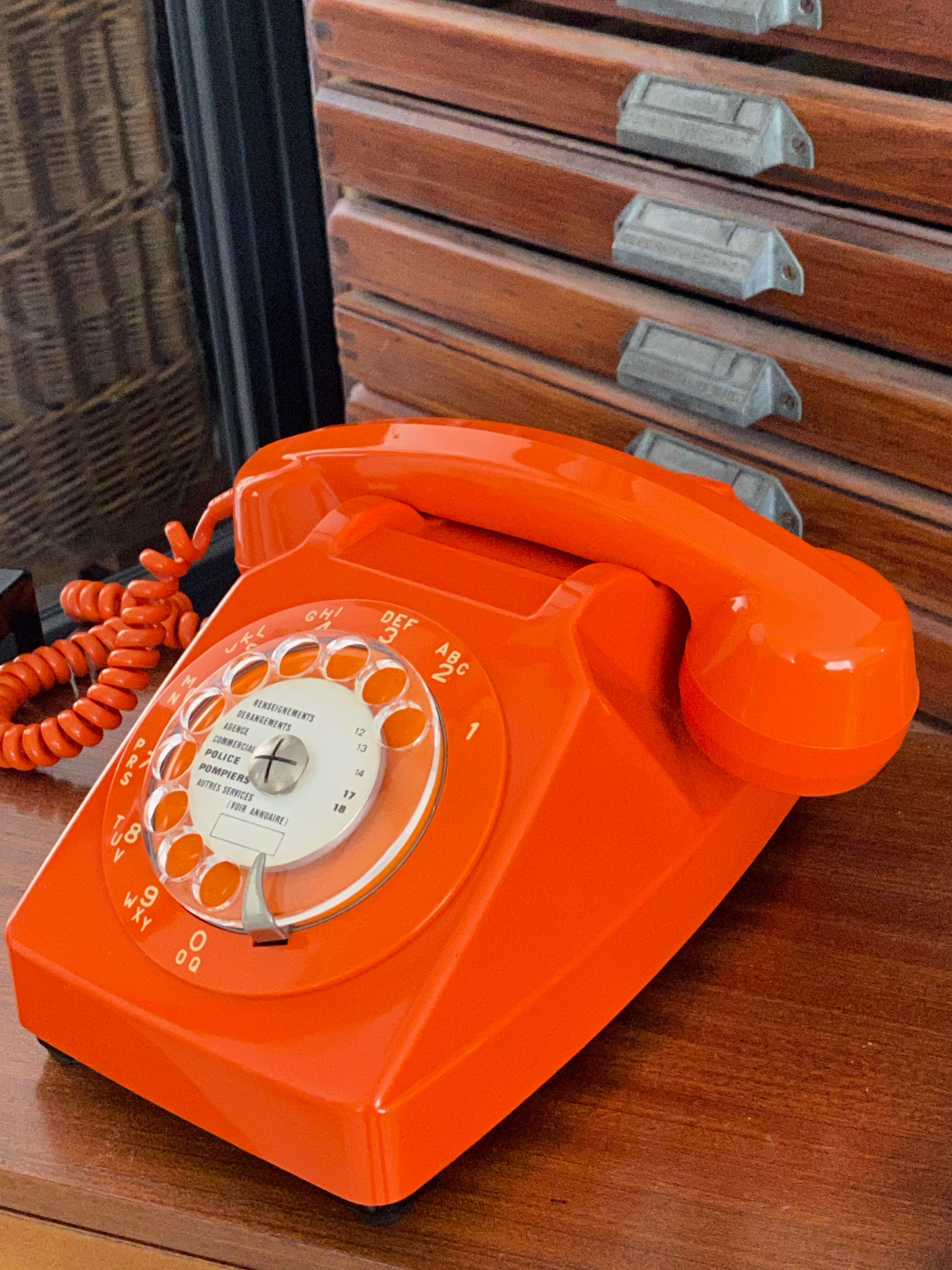 Vintage orange dial phone