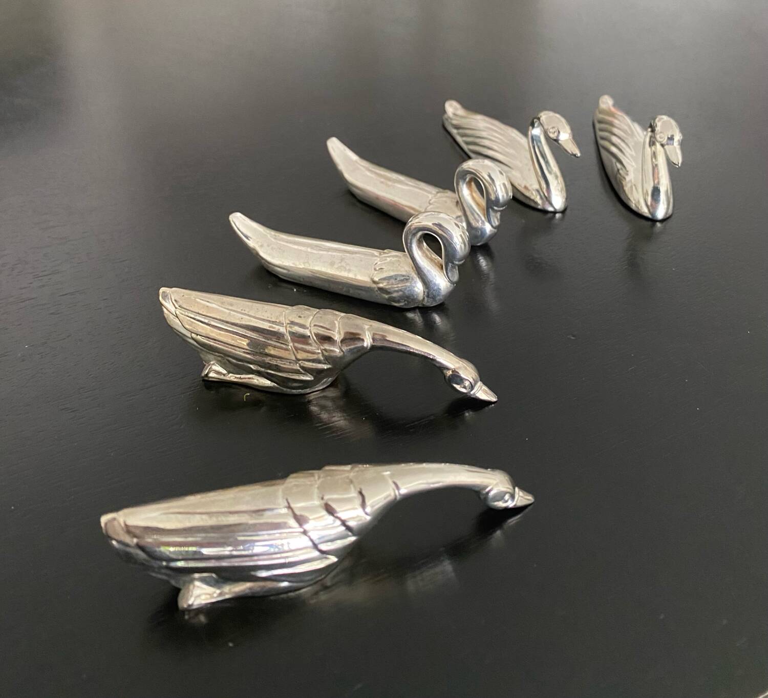 6 various animal knife holders in silver-colored metal
