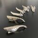 6 various animal knife holders in silver-colored metal