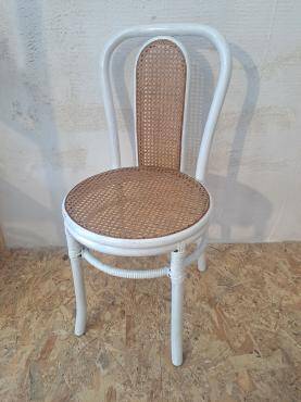 4 white rattan and cane chairs