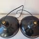 Duo of white and black enameled sheet metal pendants