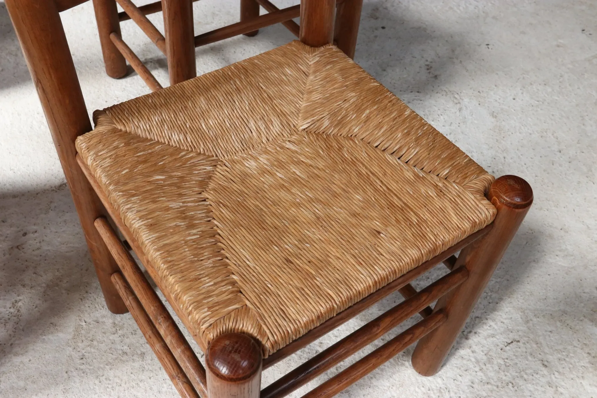 Set of four French ladderback chairs with rush seats – circa 1960