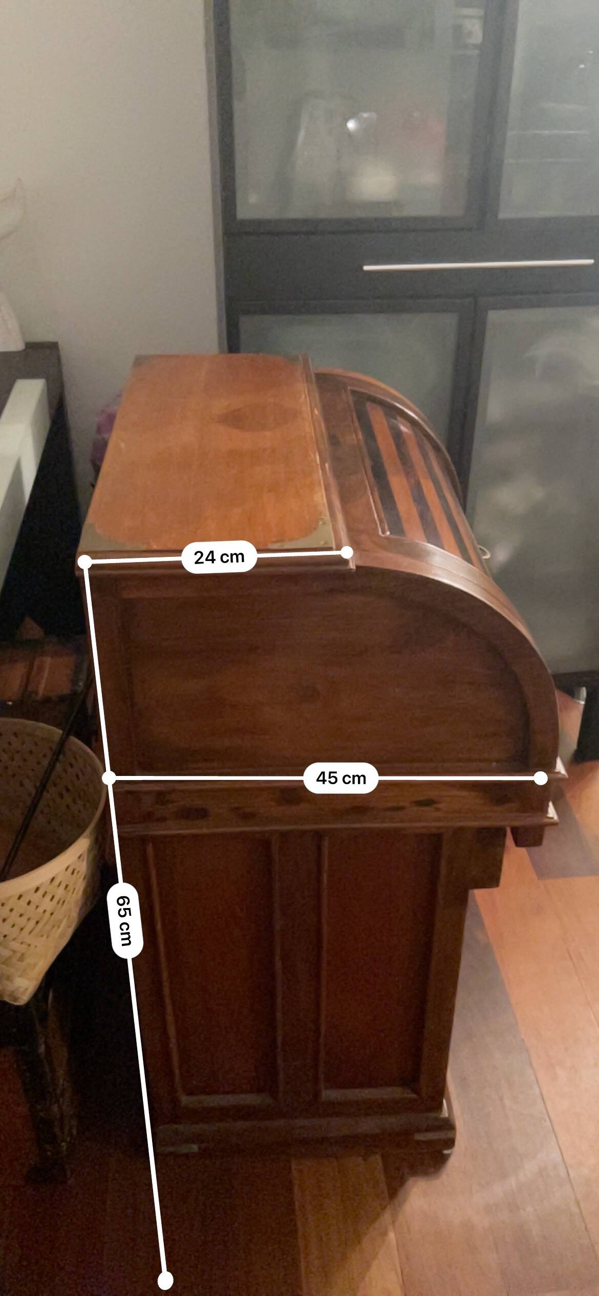 Antique solid wood secretary with a drop-down cylinder compartment.
