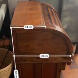 Antique solid wood secretary with a drop-down cylinder compartment.