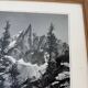 Framed old photo of a mountain landscape.