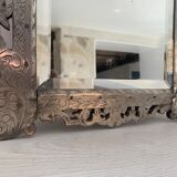 Eventful beveled mirror and openwork period 1900 repelled tin decoration