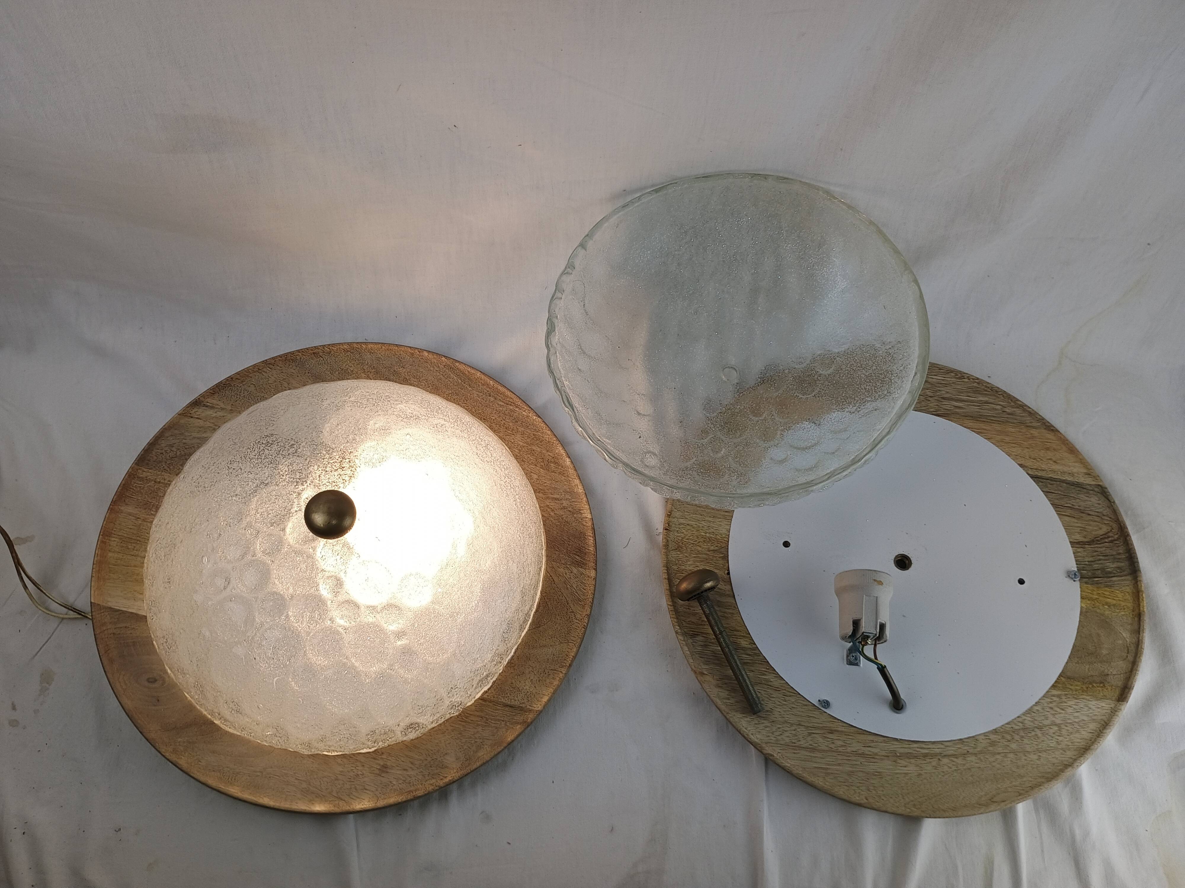 Pair of vintage Murano wall lights with exotic wood shelf.