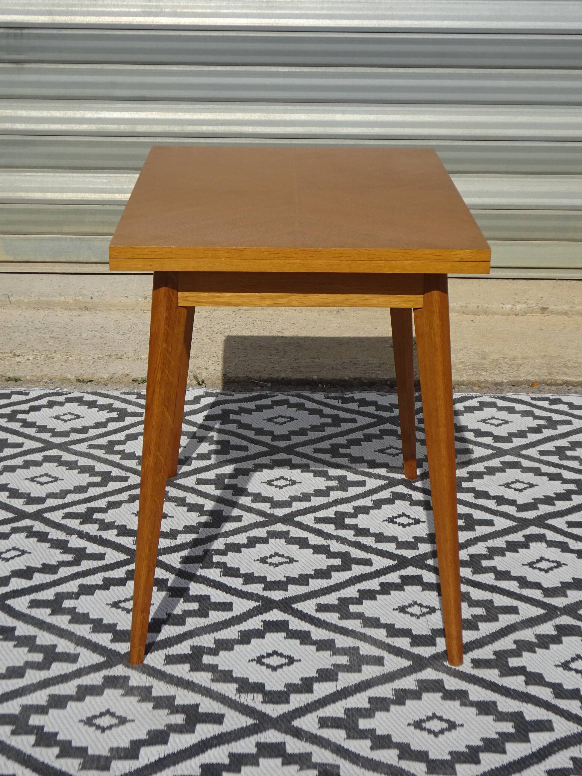 Scandinavian portfolio table model "half-century" by SAM