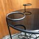 1950s round coffee table in black opaline